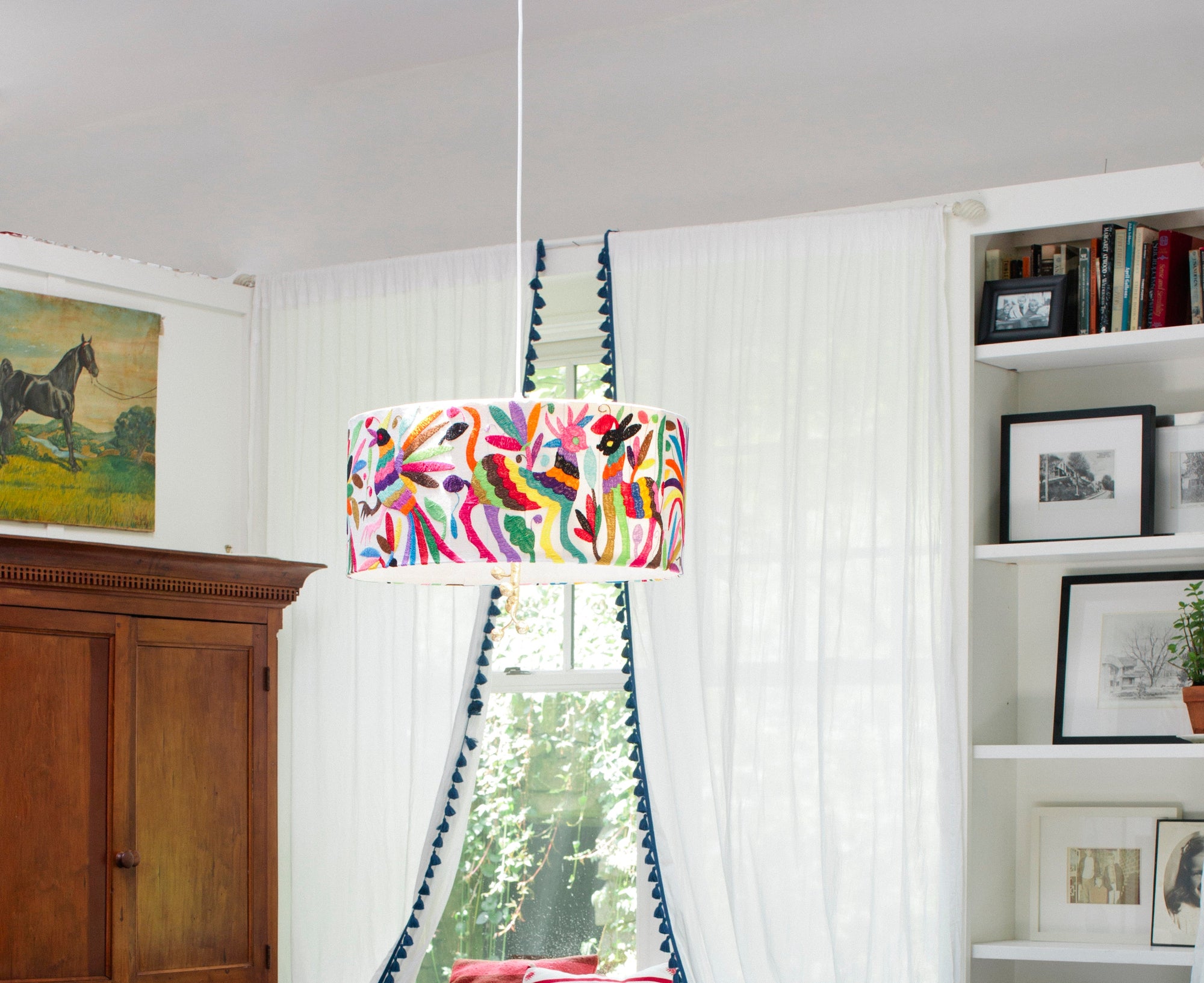 a colorful embroidered lamp shade; handmade embroidery