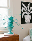 crunchberry papier mache plant in cute bedroom
